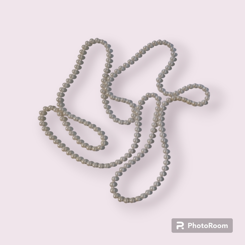 35" Long Vintage strand of faux pearl beads 35 inches long.